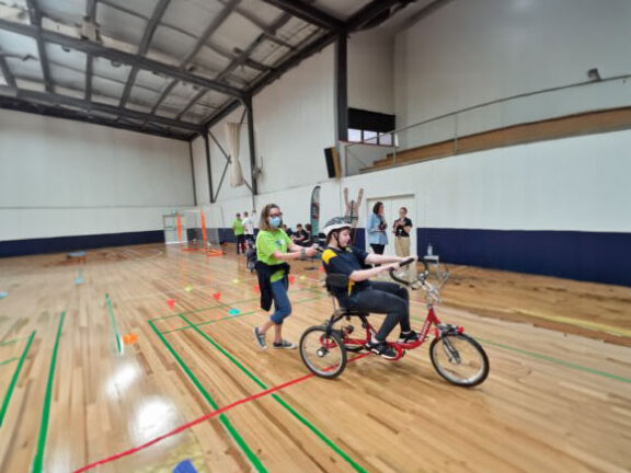 my active life participant riding a freedom wheels bike