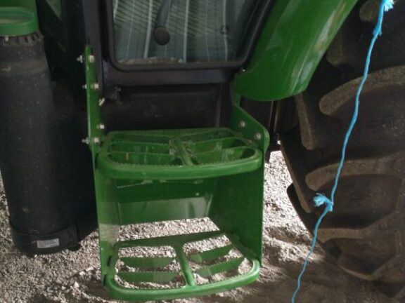 fold-down stainless-steel lower step which can flip up or down with a rope and stays in place while driving