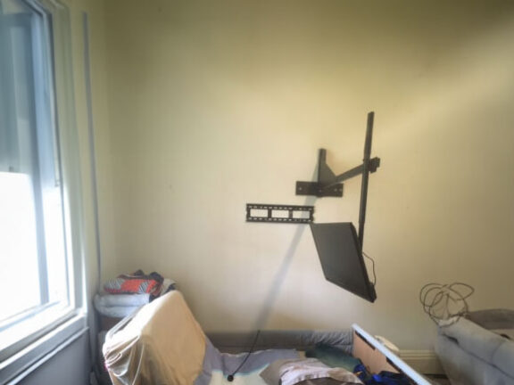 TV Mounted Safely on Extended Arm